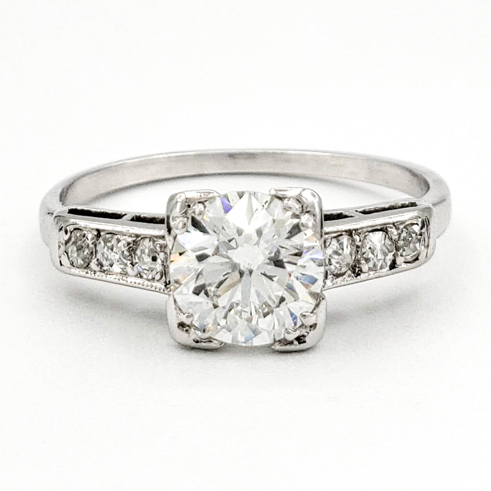 vintage-platinum-engagement-ring-with-0-68-carat-round-brilliant-cut-diamond-egl-f-vs2