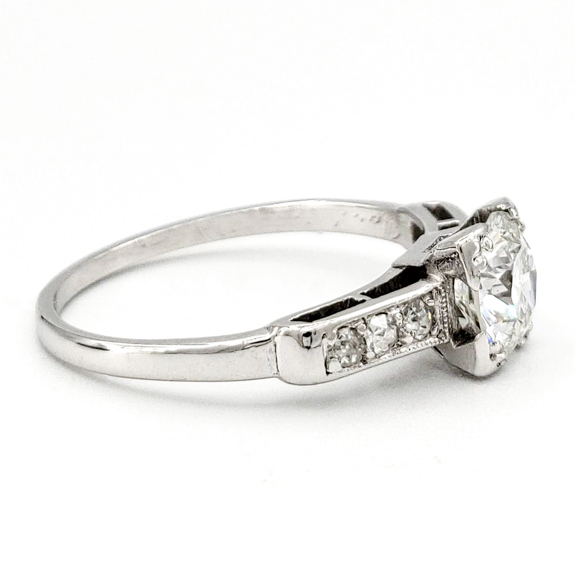 vintage-platinum-engagement-ring-with-0-68-carat-round-brilliant-cut-diamond-egl-f-vs2