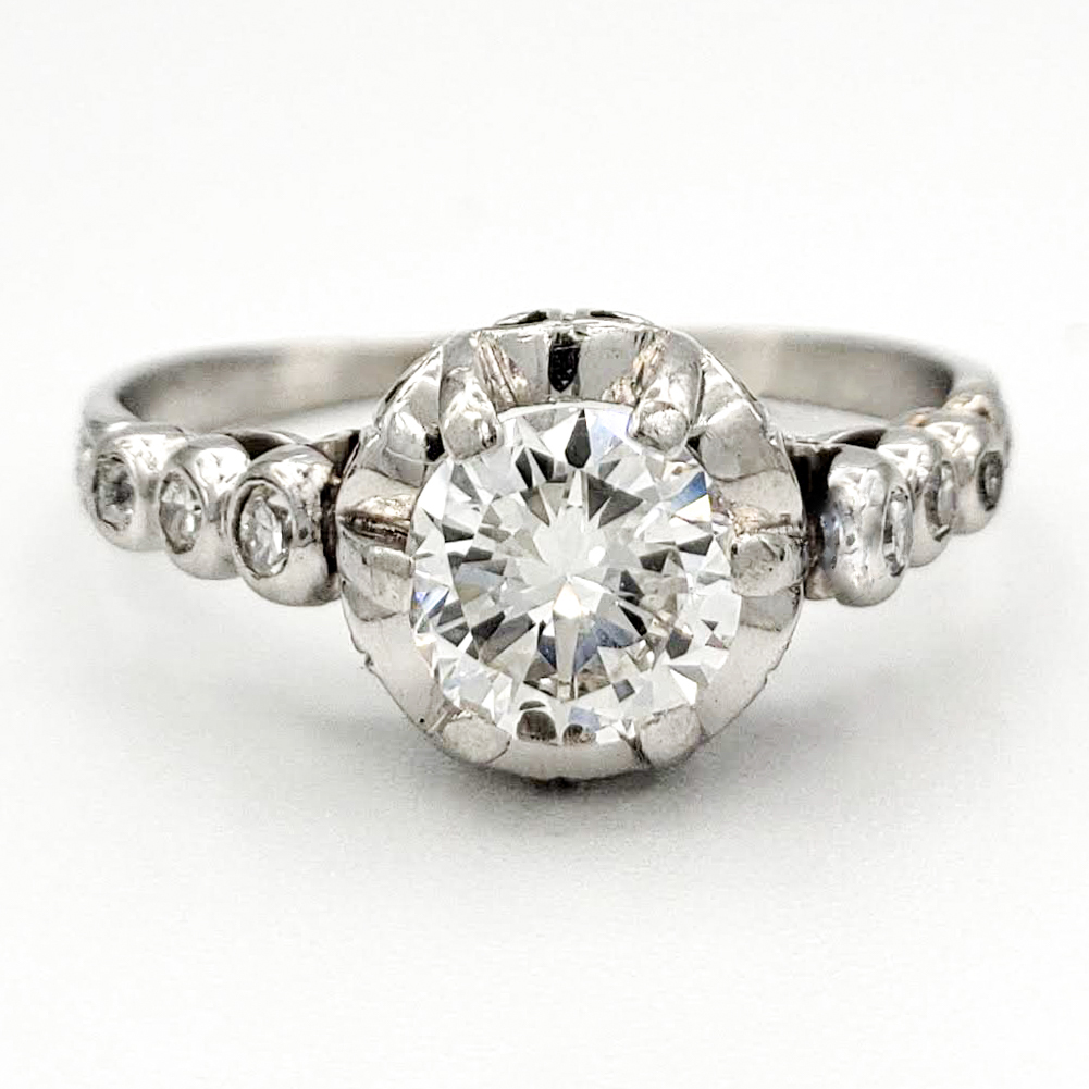 vintage-platinum-engagement-ring-with-0-57-carat-round-brilliant-cut-diamond-egl-f-si2