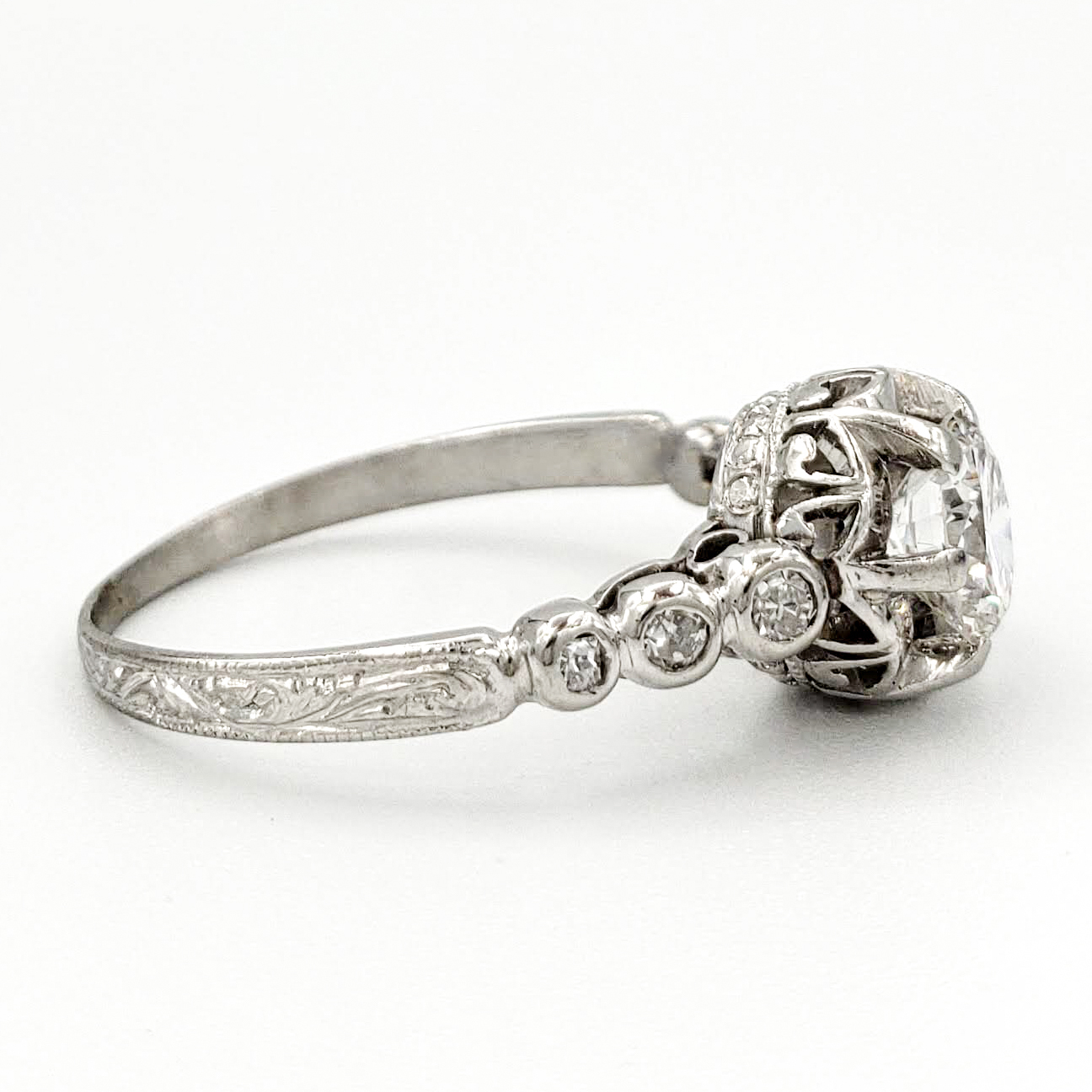 vintage-platinum-engagement-ring-with-0-57-carat-round-brilliant-cut-diamond-egl-f-si2