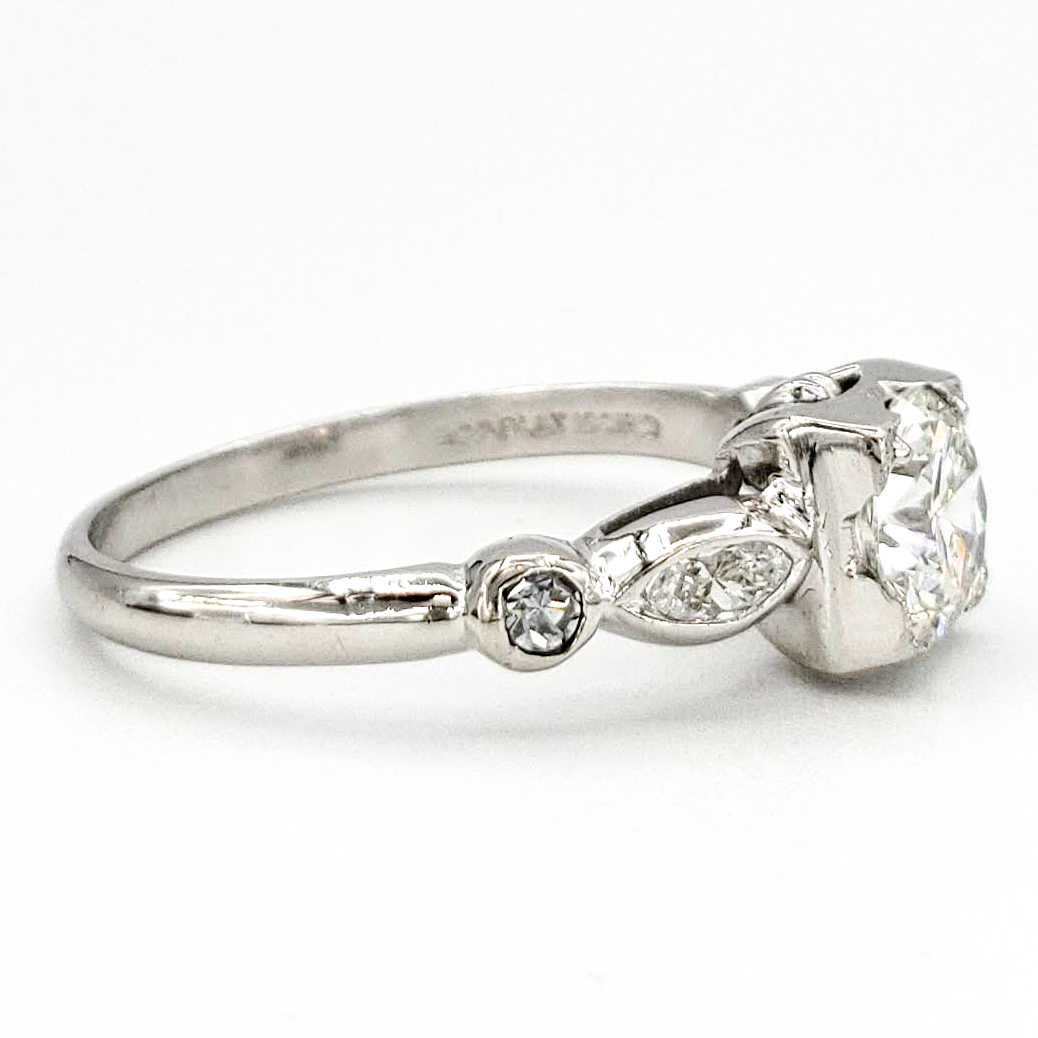 vintage-platinum-engagement-ring-with-0-69-carat-round-brilliant-cut-diamond-egl-h-vs2