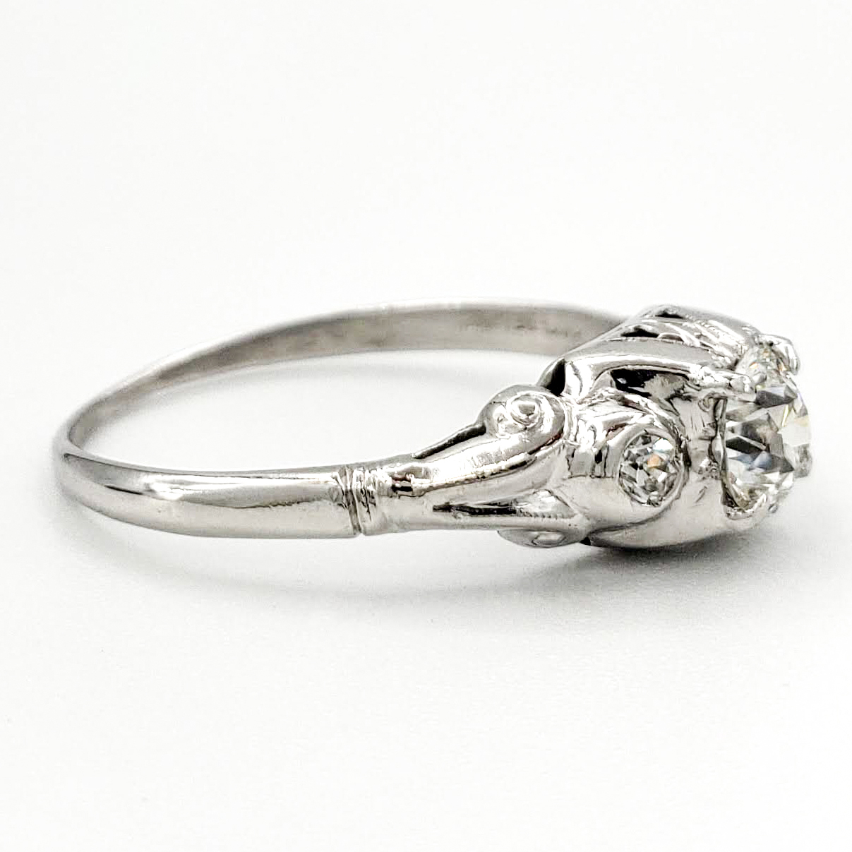 vintage-platinum-engagement-ring-with-0-39-carat-old-european-cut-diamond-egl-h-vs2