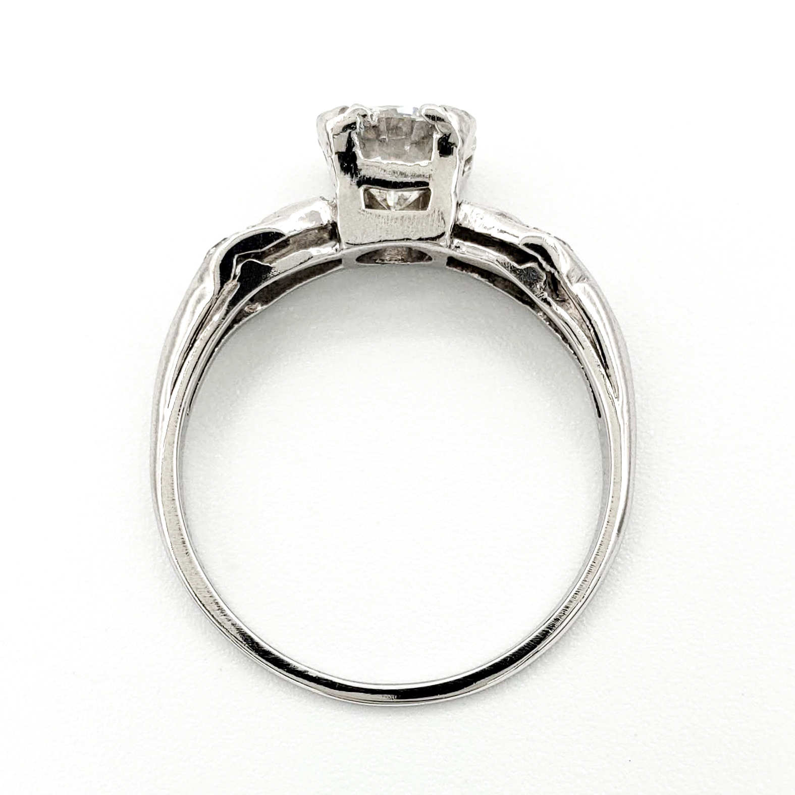 vintage-platinum-engagement-ring-with-0-72-round-brilliant-cut-diamond-egl-g-vs1