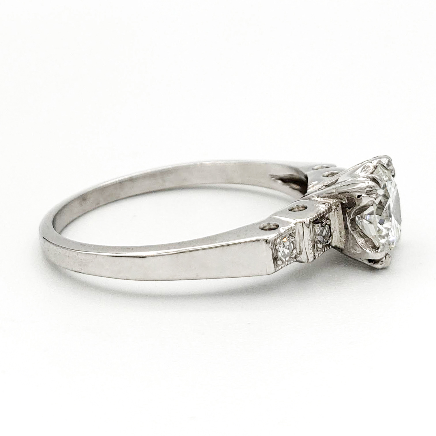 vintage-platinum-engagement-ring-with-0-66-carat-round-brilliant-cut-diamond-egl-g-vs1