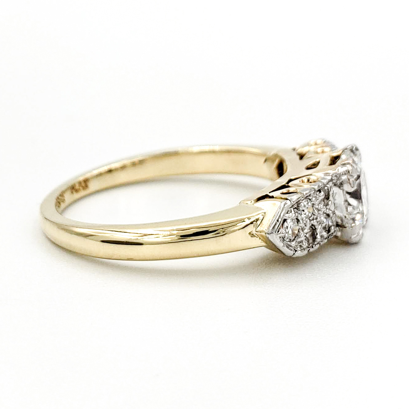 vintage-18-karat-and-platinum-engagement-ring-with-0-71-carat-round-brilliant-cut-diamond-egl-e-si1