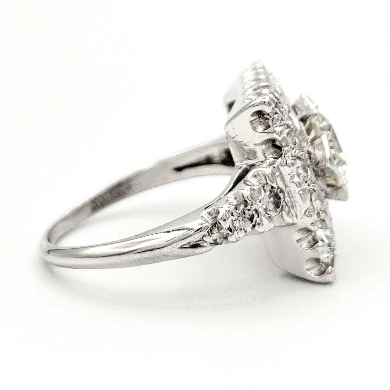 vintage-platinum-engagement-ring-with-0-74-carat-round-brilliant-cut-diamond-egl-h-vs1