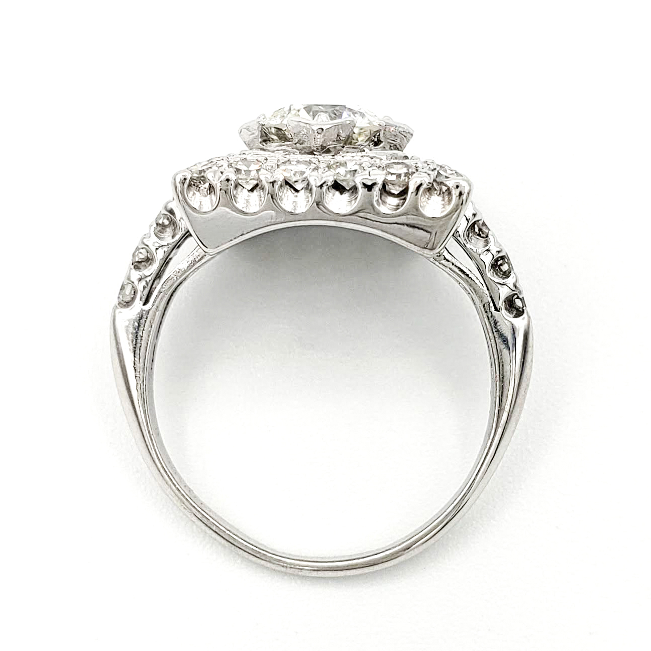 vintage-platinum-engagement-ring-with-0-74-carat-round-brilliant-cut-diamond-egl-h-vs1