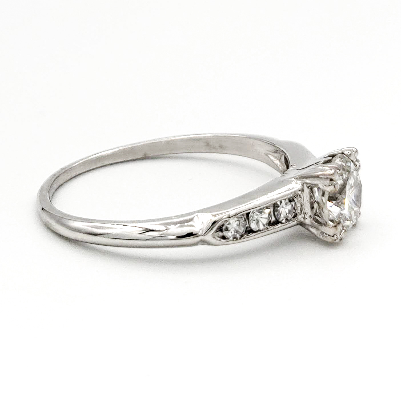 vintage-platinum-engagement-ring-with-0-56-carat-round-brilliant-cut-diamond-egl-h-vs2