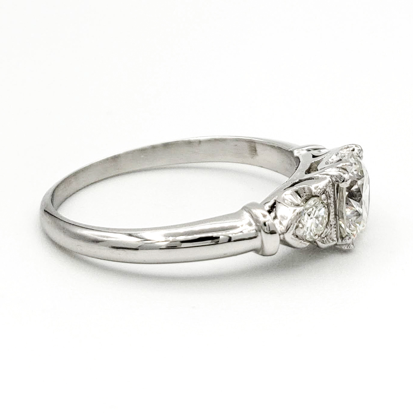 vintage-platinum-engagement-ring-with-0-58-carat-round-brilliant-cut-diamond-egl-h-vs2