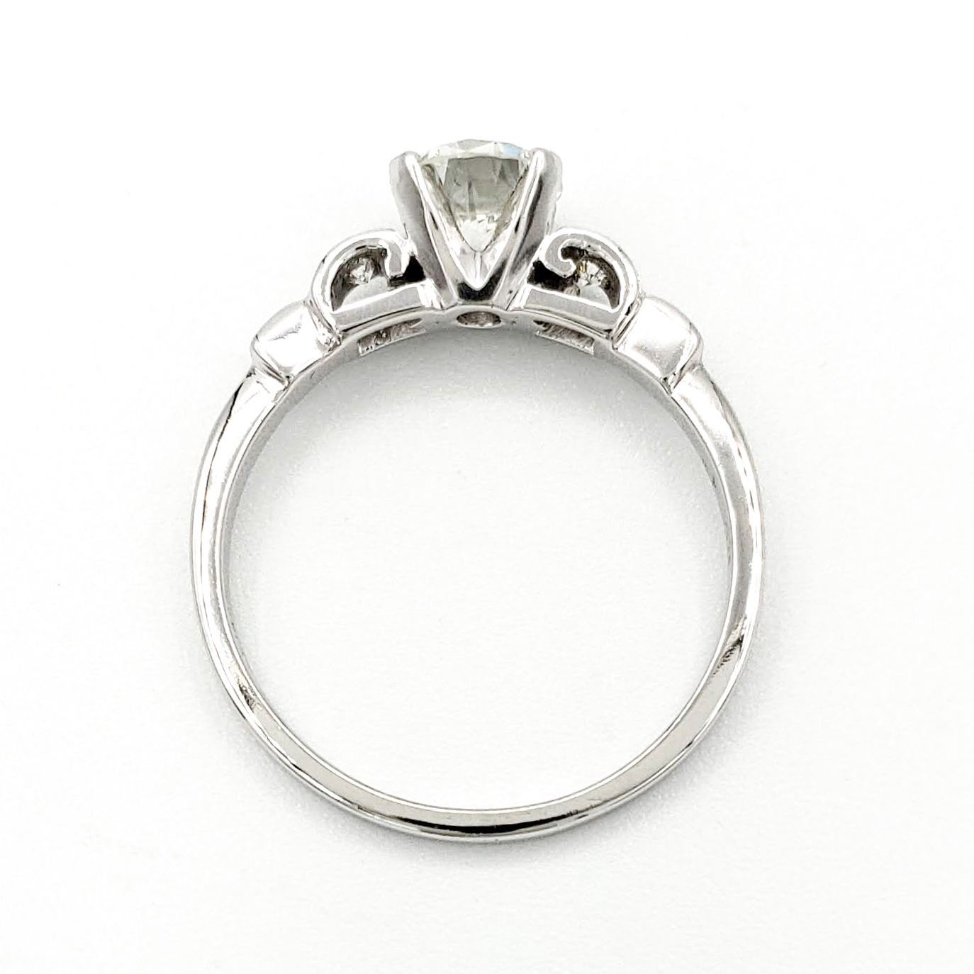 vintage-platinum-engagement-ring-with-0-63-carat-round-brilliant-cut-diamond-egl-h-si1