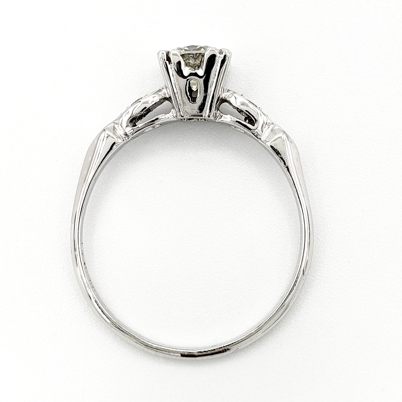 vintage-platinum-engagement-ring-with-0-75-carat-round-brilliant-cut-diamond-egl-i-vs1