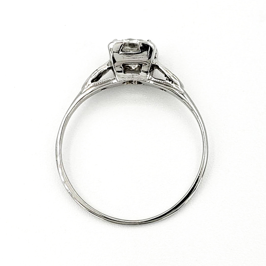 vintage-18-karat-gold-engagement-ring-with-0-58-carat-round-brilliant-cut-diamond-egl-f-vs2