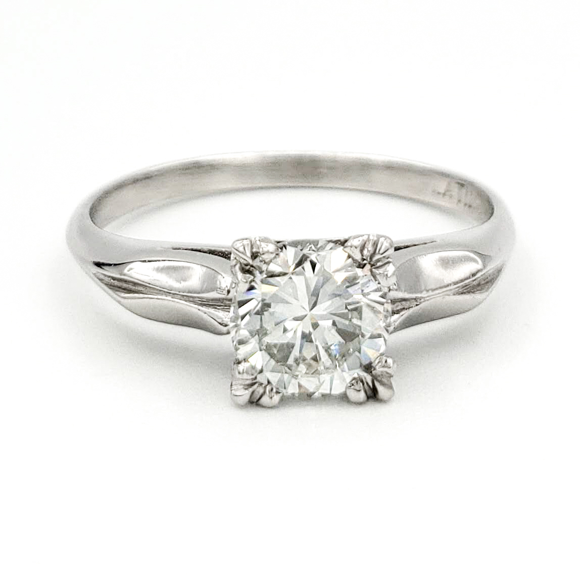 vintage-platinum-engagement-ring-with-0-63-round-brilliant-cut-diamond-egl-g-si1