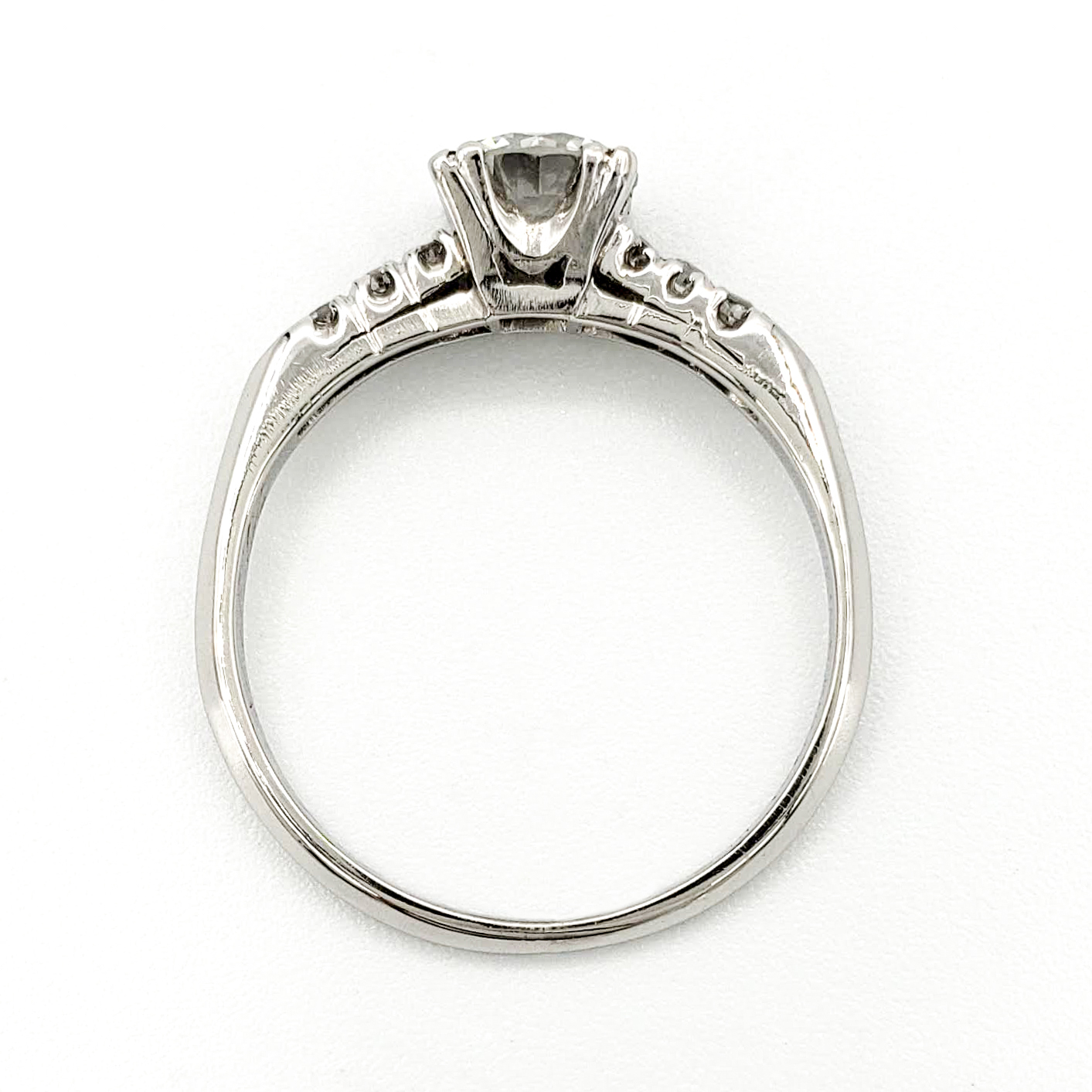vintage-platinum-engagement-ring-with-0-62-carat-round-brilliant-cut-diamond-egl-e-vs1