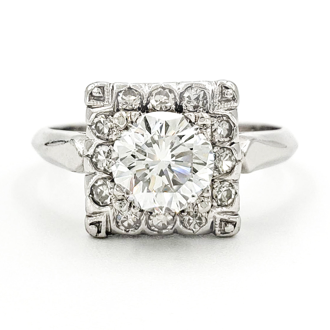 vintage-platinum-engagement-ring-with-1-10-carat-round-brilliant-cut-diamond-egl-d-vs2