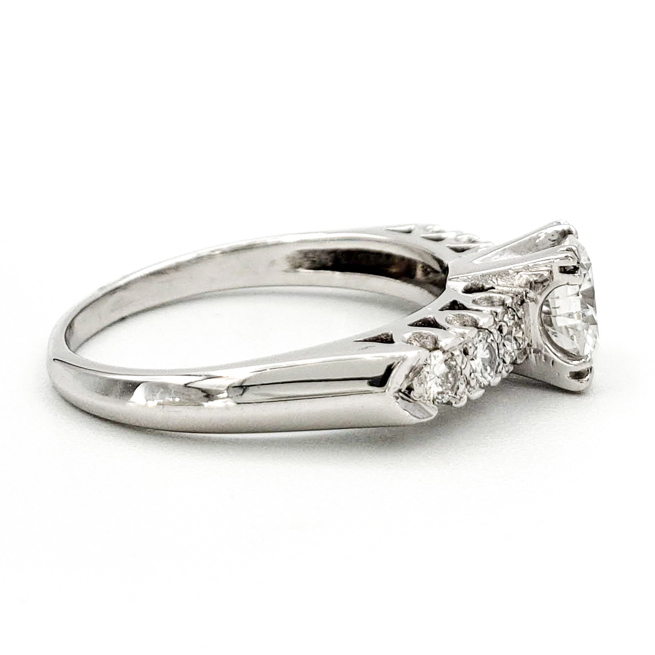 vintage-platinum-engagement-ring-with-0-66-carat-round-brilliant-cut-diamond-egl-d-si1