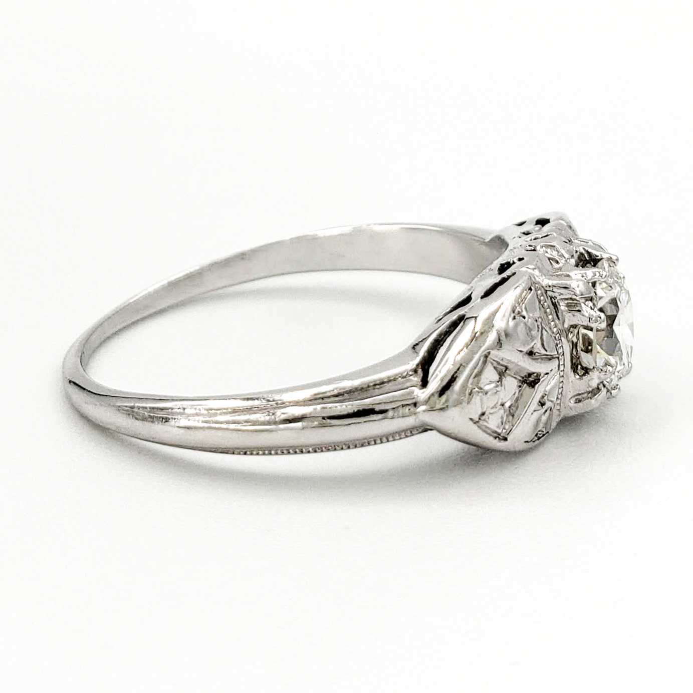 vintage-platinum-engagement-ring-with-0-38-carat-old-european-cut-diamond-egl-h-vs1