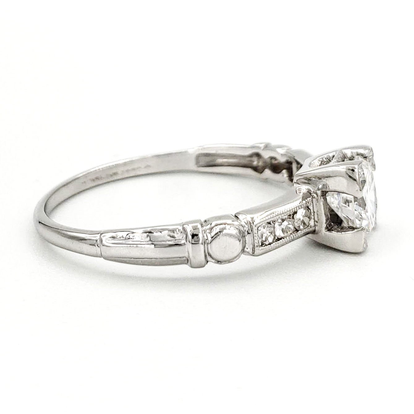 vintage-platinum-engagement-ring-with-0-42-carat-round-brilliant-cut-diamond-egl-e-vs2