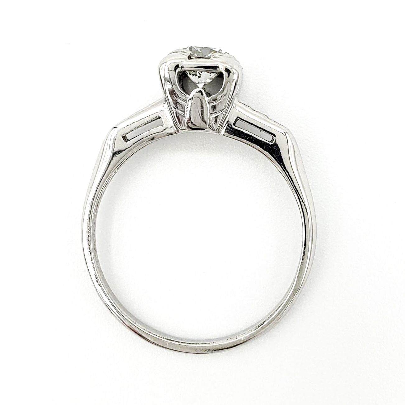 vintage-platinum-engagement-ring-with-0-58-carat-round-brilliant-cut-diamond-egl-e-vs1
