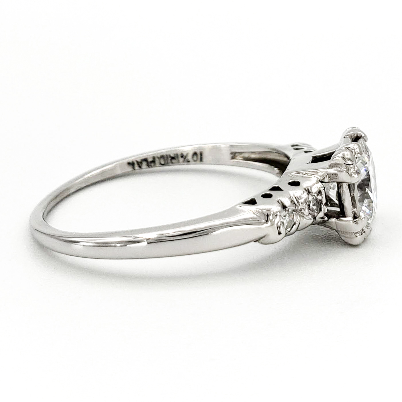 vintage-platinum-engagement-ring-with-0-63-carat-round-brilliant-cut-diamond-egl-e-si1