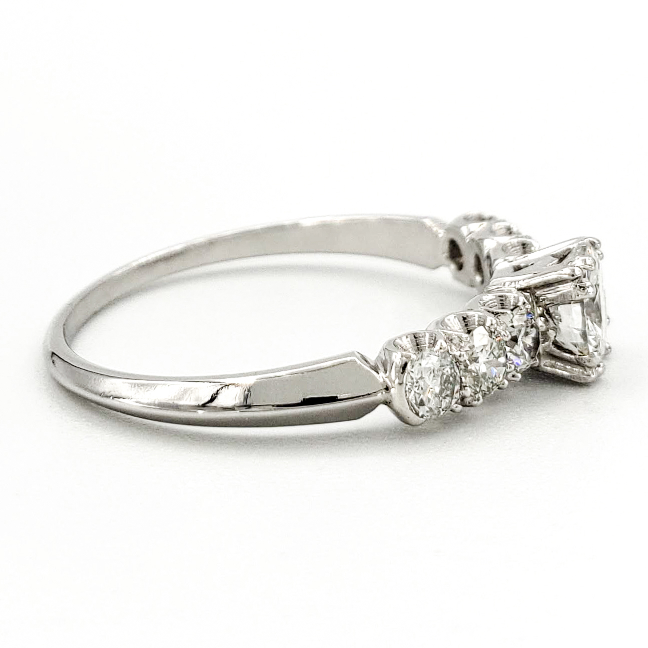 vintage-platinum-engagement-ring-with-0-38-carat-round-brilliant-cut-diamond-egl-e-vs1