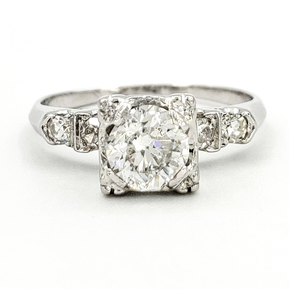 vintage-platinum-engagement-ring-with-0-74-carat-round-brilliant-cut-diamond-egl-g-si3