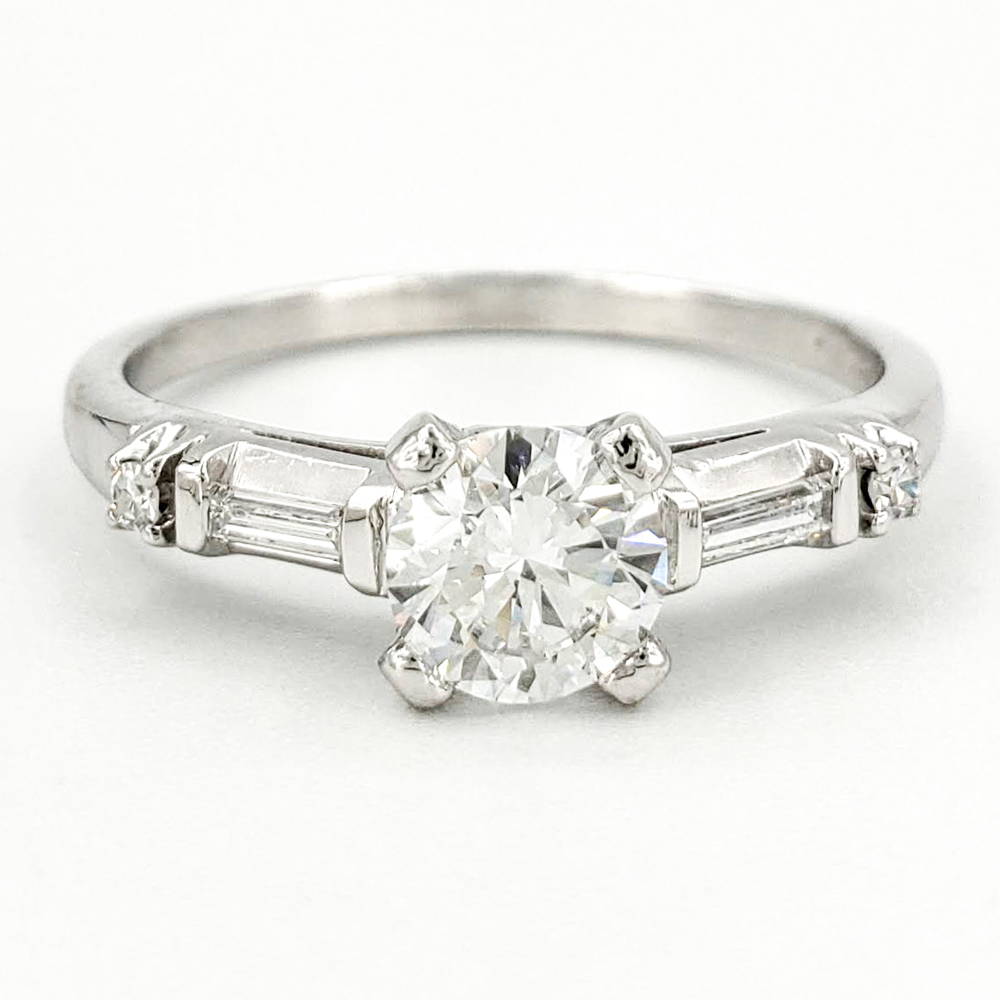 vintage-platinum-engagement-ring-with-0-56-carat-round-brilliant-cut-diamond-egl-e-vs1