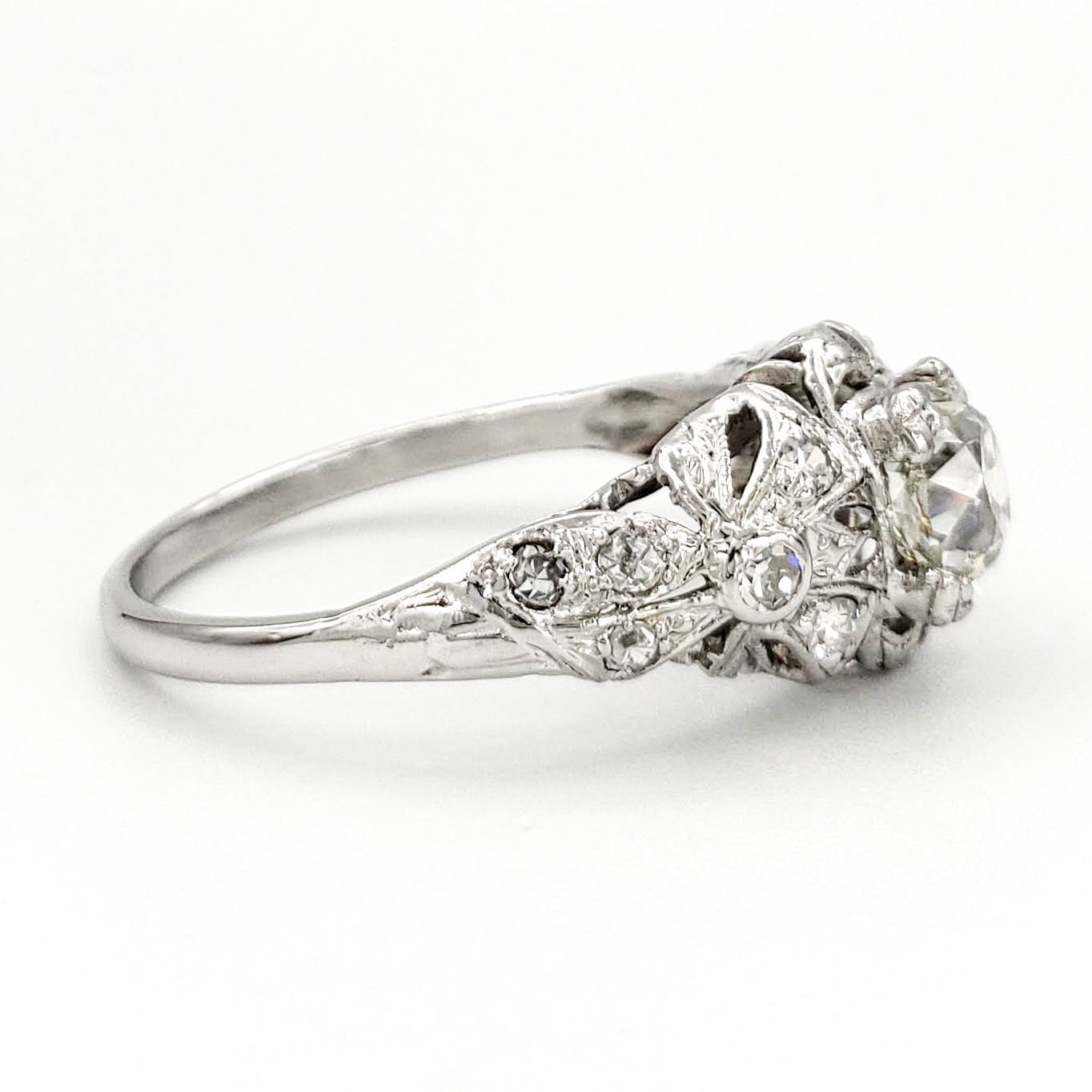 vintage-platinum-engagement-ring-with-0-80-carat-old-mine-cut-diamond-gia-j-si2