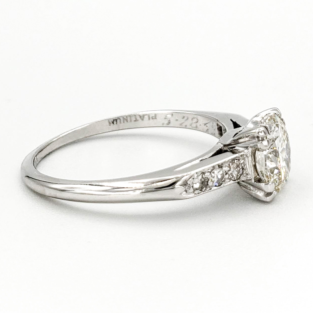 vintage-platinum-engagement-ring-with-0-68-carat-round-brilliant-cut-diamond-egl-j-vs1
