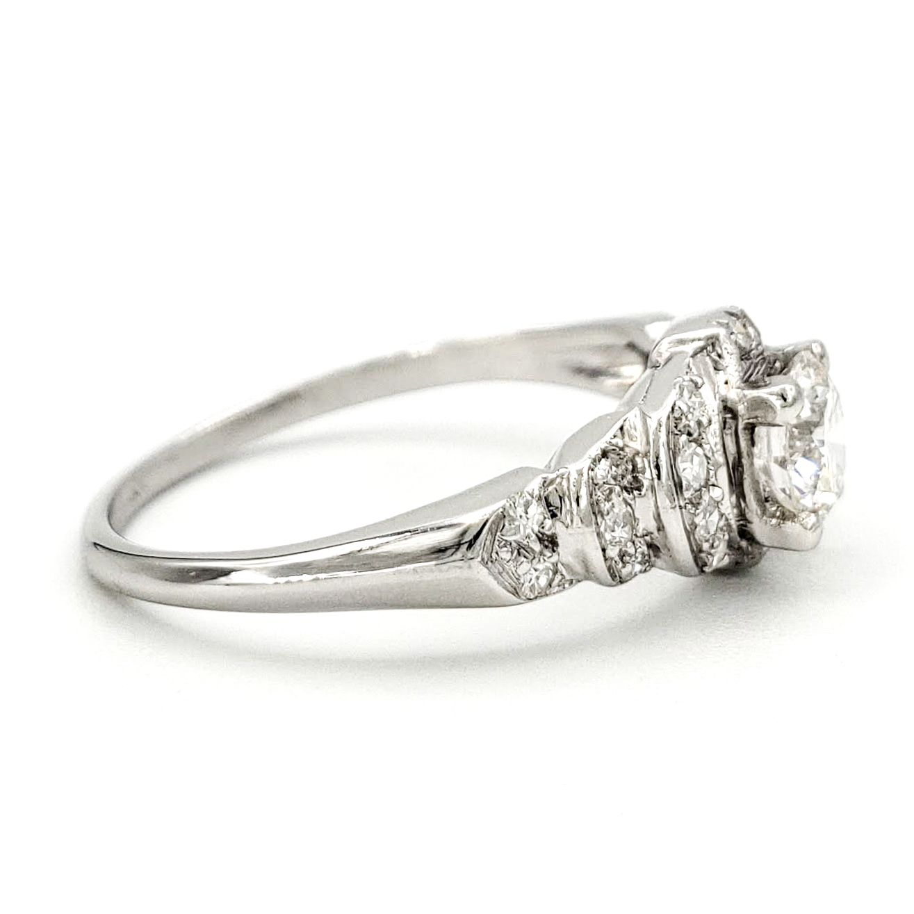 vintage-platinum-engagement-ring-with-0-43-carat-round-brilliant-cut-diamond-gia-h-si1