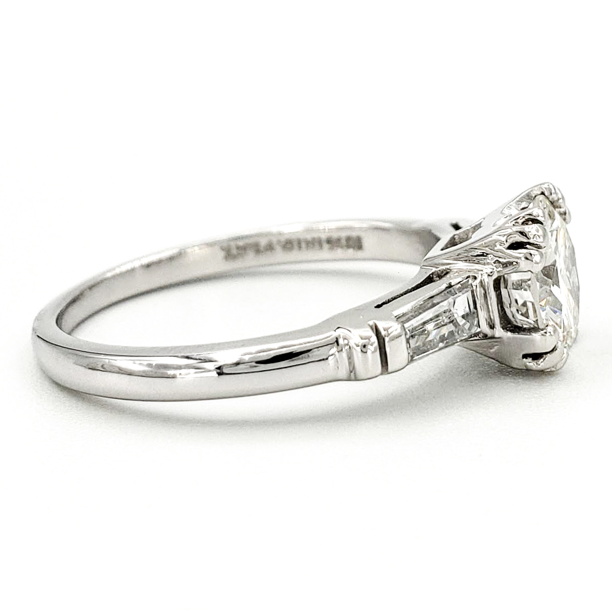 vintage-platinum-engagement-ring-with-0-87-carat-round-brilliant-cut-diamond-egl-h-vs1
