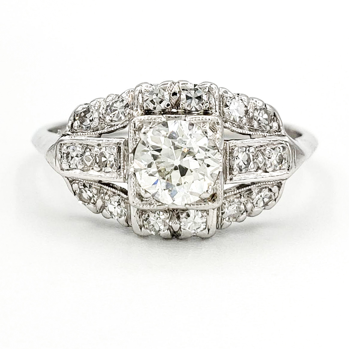 vintage-platinum-engagement-ring-with-0-55-carat-old-european-cut-diamond-egl-i-vs1