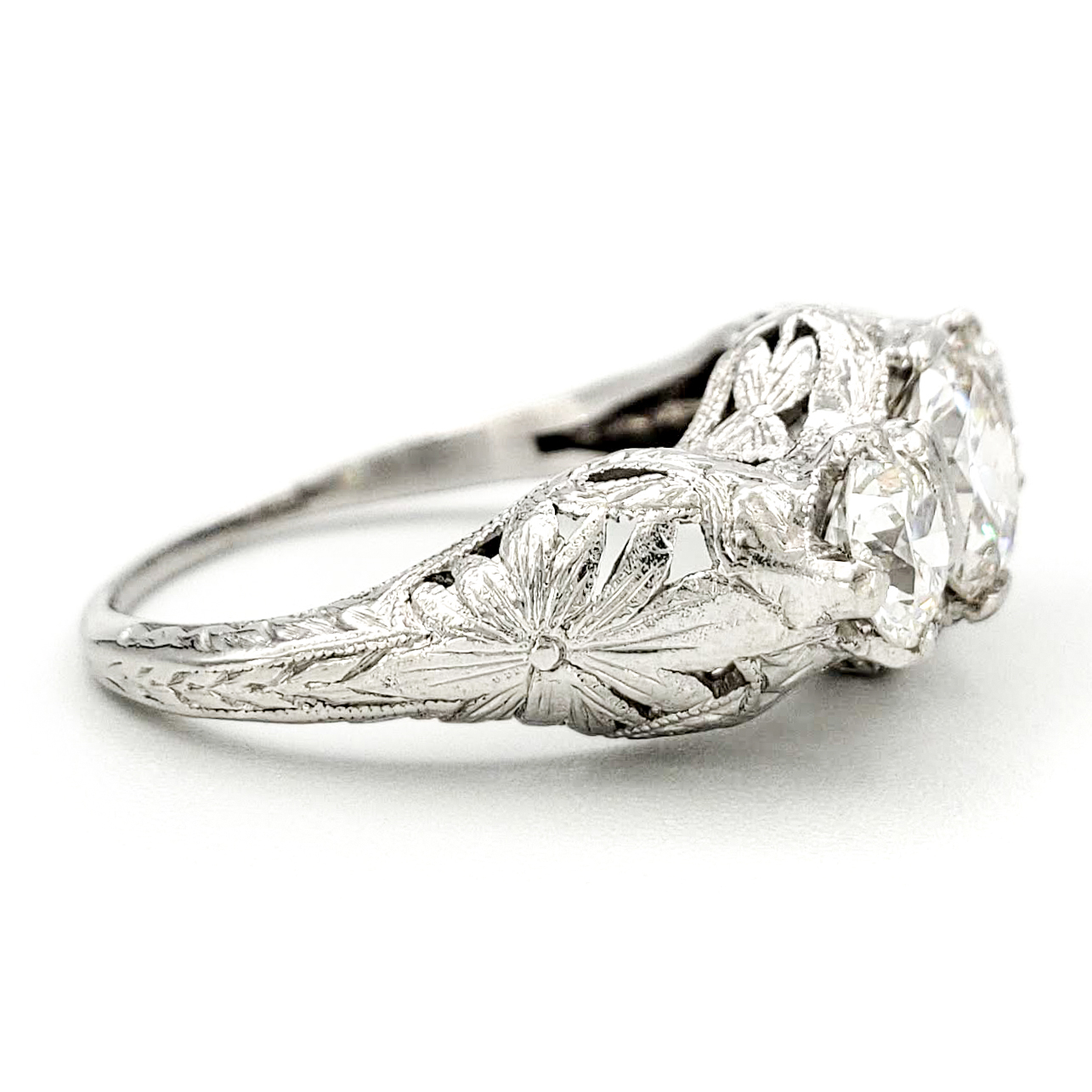 vintage-platinum-engagement-ring-with-0-83-carat-old-european-cut-diamond-egl-h-si1