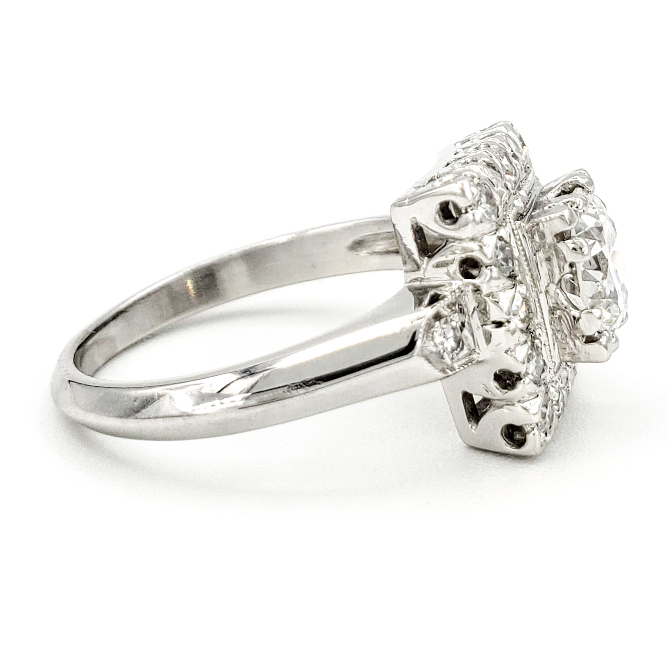 vintage-platinum-engagement-ring-with-0-58-carat-transitional-cut-diamond-gia-e-vs2
