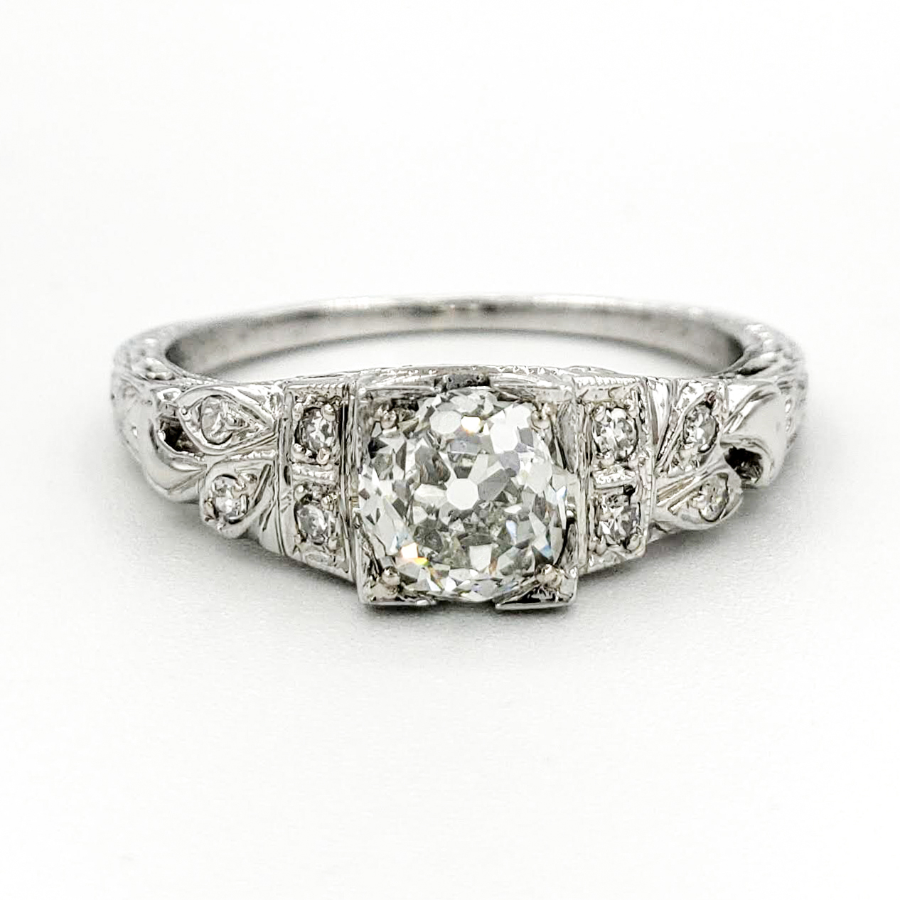 estate-platinum-engagement-ring-with-0-88-carat-old-mine-cut-diamond-gia-j-vs1