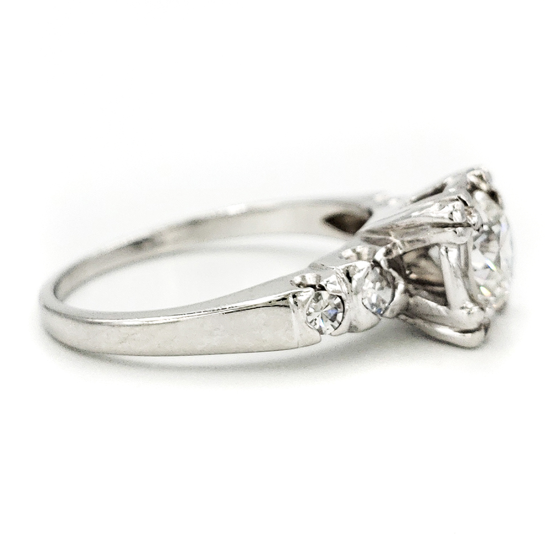 vintage-platinum-engagement-ring-with-0-77-carat-round-brilliant-cut-diamond-egl-h-vs2