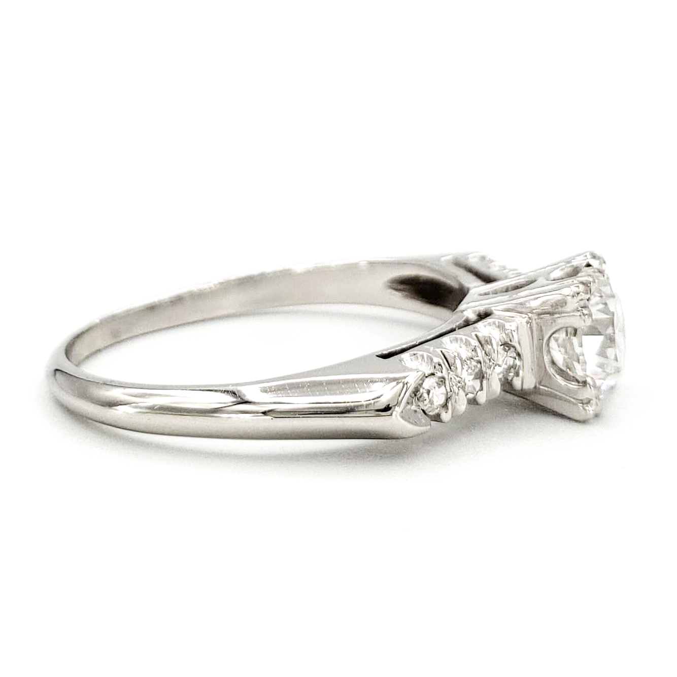 vintage-platinum-engagement-ring-with-0-72-carat-round-brilliant-cut-diamond-gia-e-si2