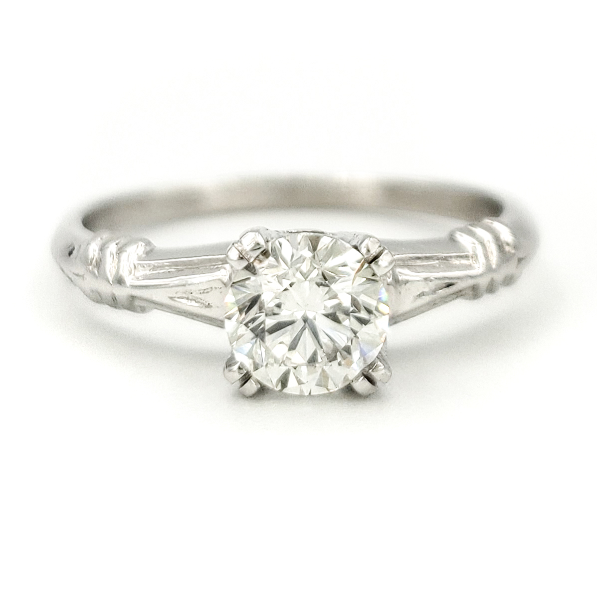 vintage-platinum-engagement-ring-with-0-83-carat-round-brilliant-cut-diamond-egl-h-si1