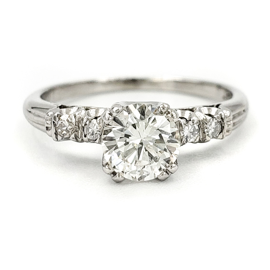 vintage-platinum-engagement-ring-with-0-61-carat-round-brilliant-cut-diamond-egl-h-si1