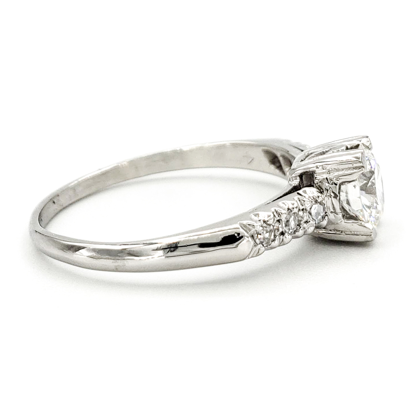 vintage-platinum-engagement-ring-with-0-57-carat-round-brilliant-cut-diamond-egl-e-vs2