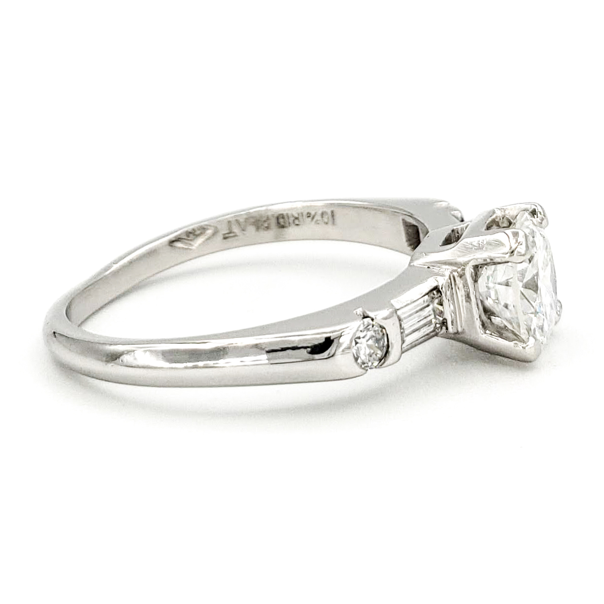 vintage-platinum-engagement-ring-with-0-57-carat-round-brilliant-cut-diamond-gia-e-vs2