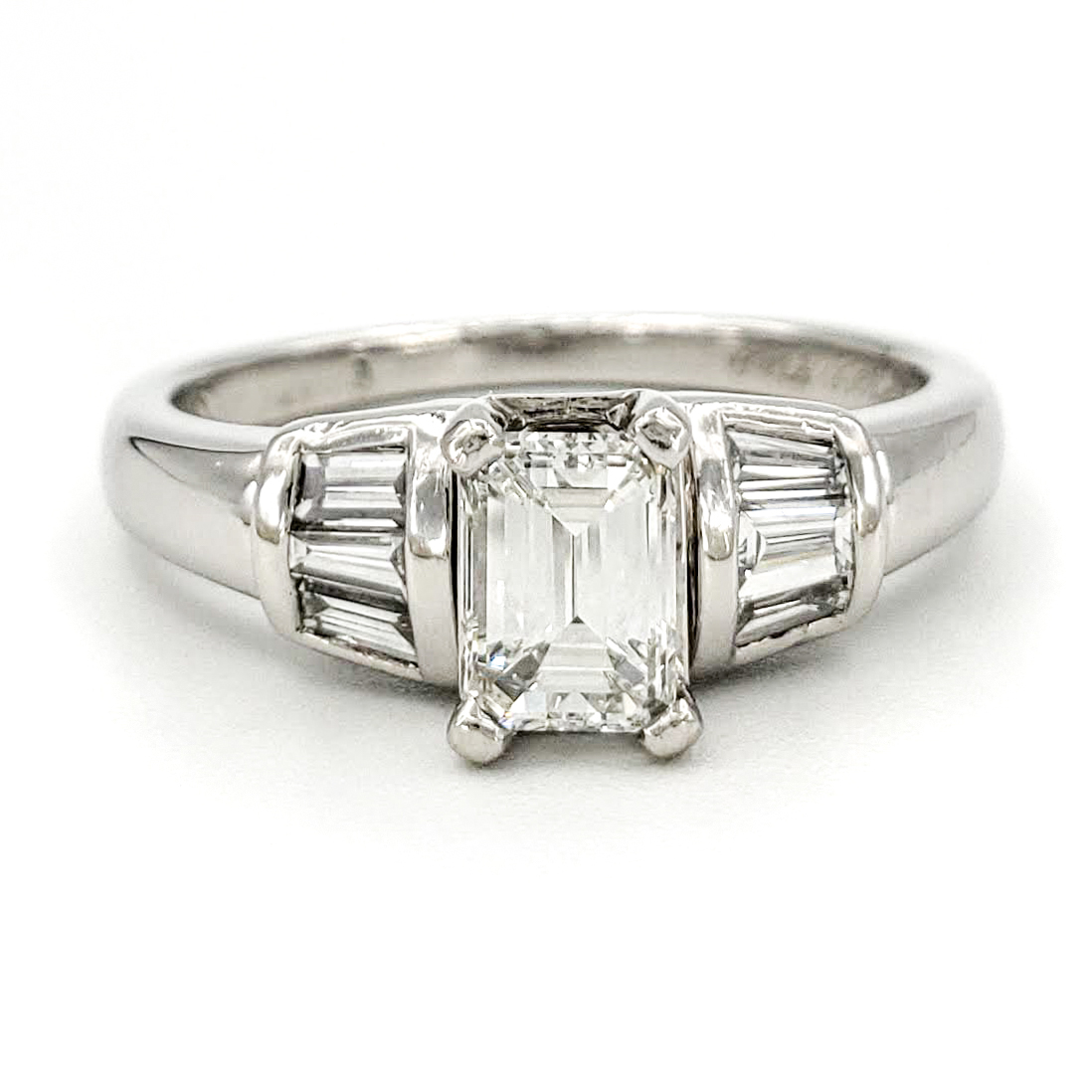 vintage-platinum-engagement-ring-with-0-61-carat-emerald-cut-diamond-gia-h-vs1